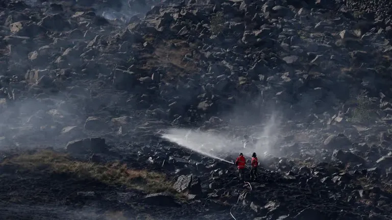 Fireworks suspected as fire rages at Dovestone reservoir, suspect in custody