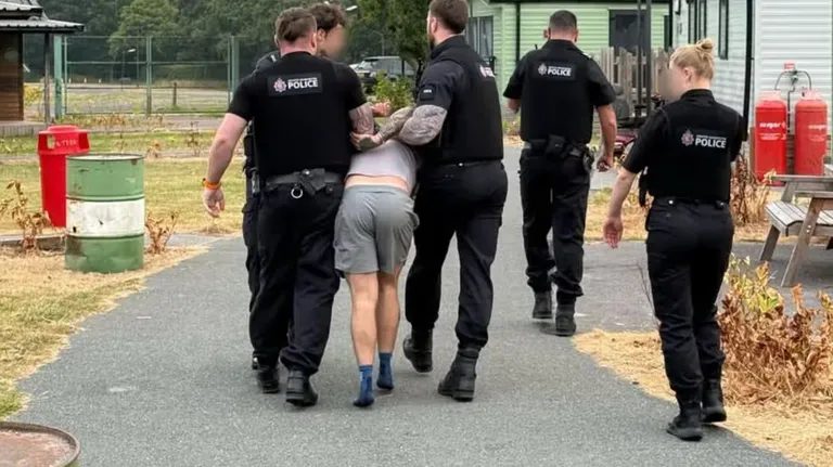 Wanted man who used fake names to avoid police for two years arrested on suspicion of stalking
